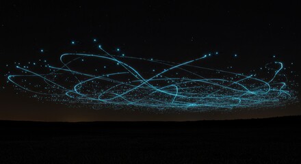 Abstract light trails in night sky with glowing lines