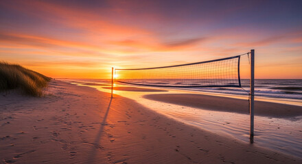 Beach Volleyball Net at Sunset with Warm Orange Glow on Sandy Shore for Outdoor Recreation