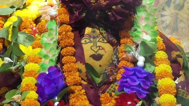 Holy havan fire ritual performed in front of Goddess Durga idol during Durga Puja festival in India. Spiritual atmosphere, Hindu religious ceremony, traditional worship and cultural celebration.
