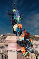 Vibrant D&iacute;a de los Muertos offerings at Terlingua Cemetery.