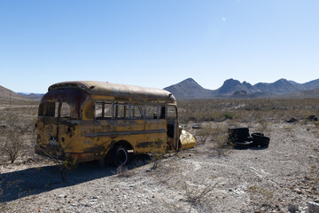 An abandoned bus rusts in the desert near Naco, Arizona.