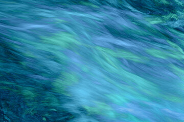 Obraz premium blue water abstract background of soft velvety creek flow for background