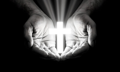 Human hands holding a bright glowing Christian cross in a dramatic black and white spiritual image.