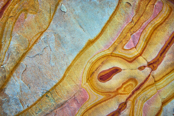 Artistic Sandstone Texture with Colorful Layers and Abstract Natural Patterns