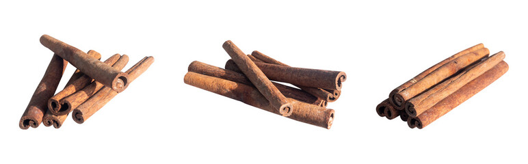 set of stacked cinnamon sticks isolated on white