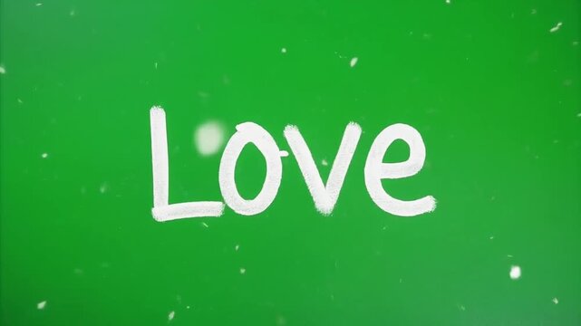 The word "Love" written in white chalk on a vibrant green background with subtle white speckles. 