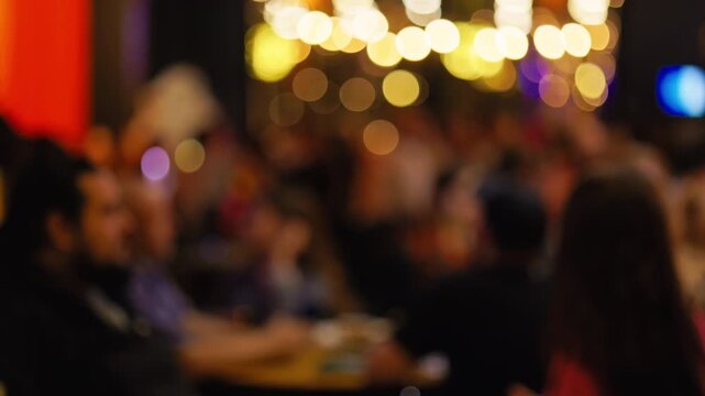 Fuzzy networking scene, Casual business gathering atmosphere, Unfocused group engaging in informal discussions slow motion
