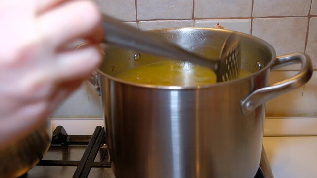 They are preparing aspic on the stove