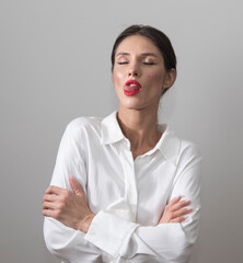Beauty portrait of a beautiful girl, natural make-up and red lip color.