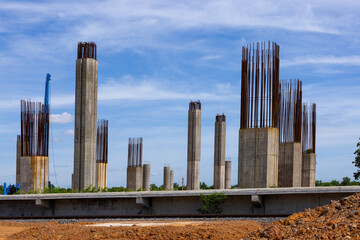 New construction site with crane and mechanical equipments on daylight sky background. construction industry. High-speed train of Chinese made For Thailand. Transportation infrastructure construction.