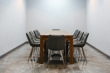 Empty conference room with grey chairs