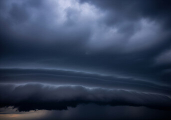 Dramatic storm clouds gather over the horizon, showcasing nature's raw power and the majestic beauty of an approaching tempest across the vast sky