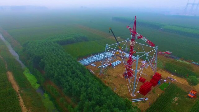 High Voltage Tower Construction Commissioning in Forest Landscape