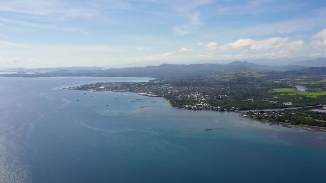 The modern city of Surigao with a seaport and buildings. Mindanao, Philippines. Surigao del Norte.
