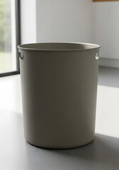 Modern olive trash receptacle in a serene kitchen environment setting