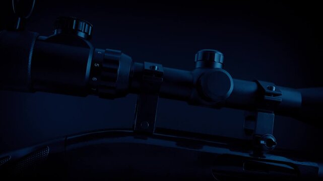 Scope On Sniper Rifle In Dark Room
