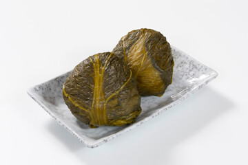 高菜の葉で包まれたおにぎり Japanese rice balls wrapped in pickled mustard leaves