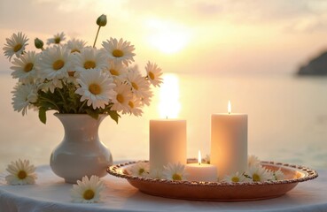 White daisy bouquet sits by lit candles on copper tray. Soft ocean sunset provides warm light. Romantic table setting suggests proposal or wedding proposal.