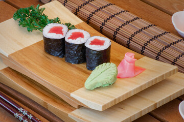 sushi on a wooden board