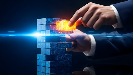 Finger pushing glowing orange block into blue stack symbolizing inputting data and system update