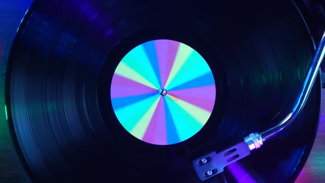 Vinyl Records Spinning and Playing in Flashing Disco Lights, Top Down View, Close Up
