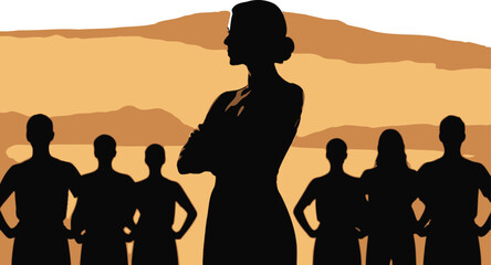 Fototapeta premium Assertive female leader with crossed arms stands confidently before her team in a warm landscape