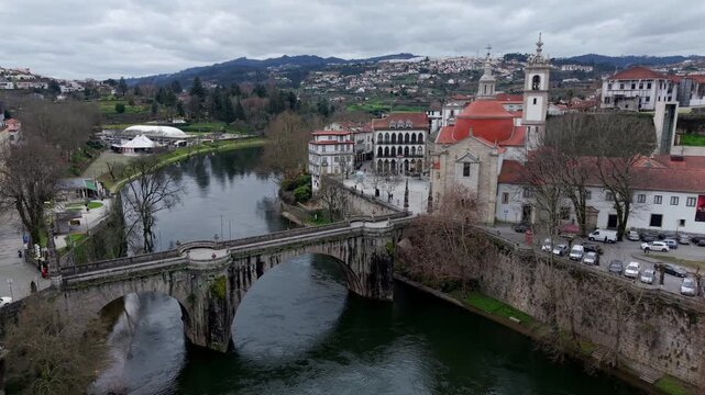 Historic St Goncalo stone bridge over Tamega River connecting Sao Goncalo catholic church, Amarante, Aerial