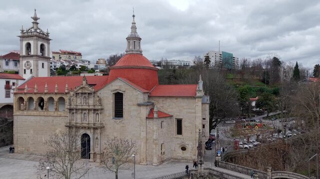 Medieval Sao Goncalo catholic church neoclassical facade, Amarante city, Drone shot