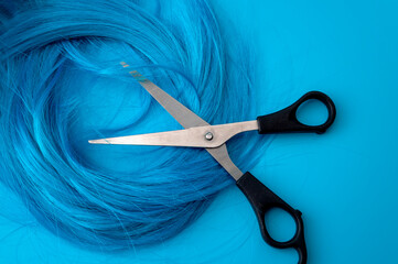 Fashionable colouring and styling, professional haircare salon and chic hairstyle trend concept with vibrant shiny blue hair isolated on plain background