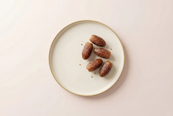 Dates on white plate top view