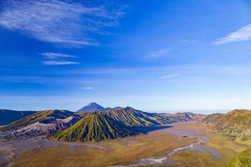 Obraz premium The Bromo, or Mount Bromo, is an active somma volcano, a Hindu pilgrimage site, and part of the Tengger mountains, in East Java, Indonesia.