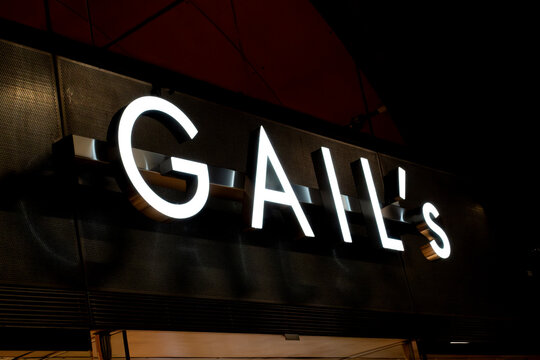 London, UK - January 09 2025: Illustrative editorial Illuminated GAIL's Bakery storefront sign at night in London, UK