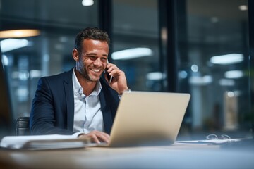 mature businessman working on laptop