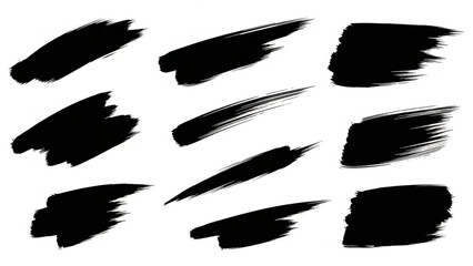 Set of black brush strokes on white background for design and artistic use
