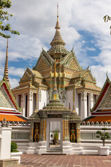Fototapeta premium Colorful temple complex of Bangkok's Wat Pho, or Phra Chetuphon Wimon Mangkhalaram Rajwaramahawihan - Bangkok, Thailand 