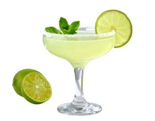 Refreshing lime cocktail in coupe glass with mint & lime wedge