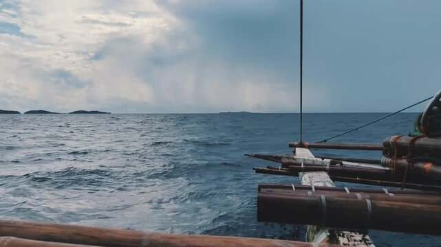 Sailing swiftly to outrun the approaching rain