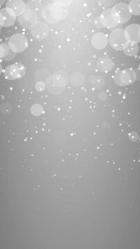 Elegant white dust particles with light bokeh slowly drifting in motion. Full HD. 4K