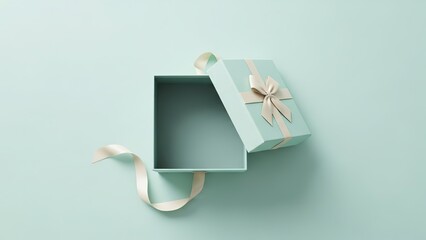 An open gift box with a light blue color and cream ribbon lying on a matching background, top-down view, for a minimal aesthetic