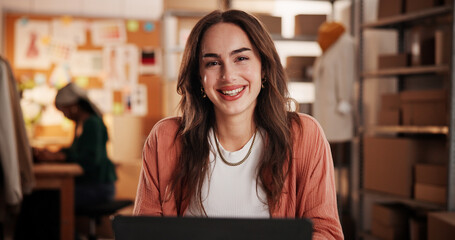 Woman, laptop and portrait for dropshipping, smile and project with fashion, pride or clothes at startup. Person, entrepreneur and designer with pc, happy and creativity with ecommerce at workshop © peopleimages.com