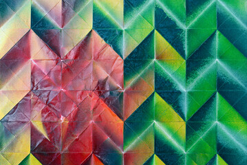 Folded spray painted colorful paper art, Japanese origami background texture, abstract geometric pattern artwork