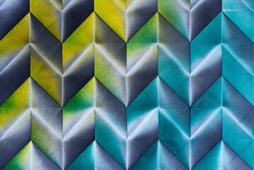 Folded spray painted colorful paper art, Japanese origami background texture, abstract geometric pattern artwork