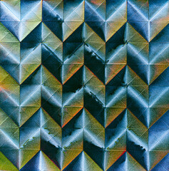 Folded spray painted colorful paper art, Japanese origami background texture, abstract geometric pattern artwork