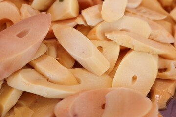 Pickled bamboo shoots, or "Nor Mai Som" as it's called in northeastern Thailand, is a popular Thai food preservation method that extends shelf life and creates a sour flavor.