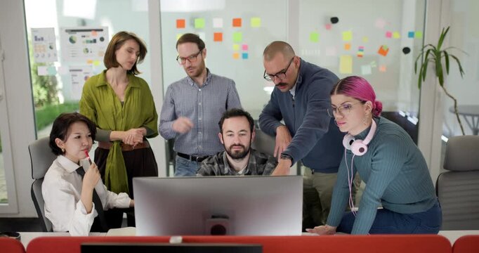 Team collaborates on project in modern office space, discussing ideas and sharing insights during a productive work session in the city