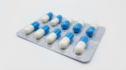 Blister Pack of Blue and White Capsules for Medication Healthcare and Pharmaceutical Concept
