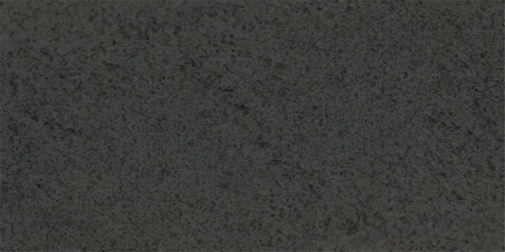 A dark and rough closeup of a black asphalt road surface featuring a textured bitumen pattern and gray stone material suitable for a street backdrop or wallpaper design