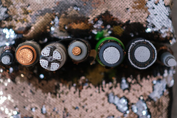 Different types of industrial electric cable. Cross section of various power cables. Electrical wire for energy and communication.