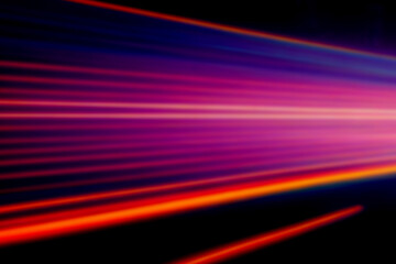 Racing crimson and magenta light trails, layered neon streaks stretching across darkness like a high speed data stream or futuristic hyperspace lane pulsing with kinetic digital energy

