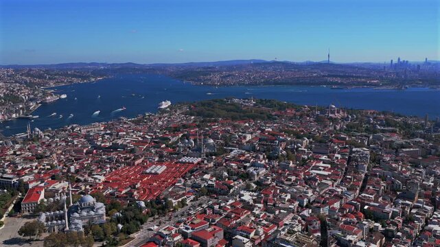 Morning Istanbul Turkey T&uuml;rkiye aerial drone sunny blue clear skies autumn Harbor view Blue Mosque synagogue temple cityscape skyscrapers Fatih Yenikapı Port Bosphorus Strait forward down motion